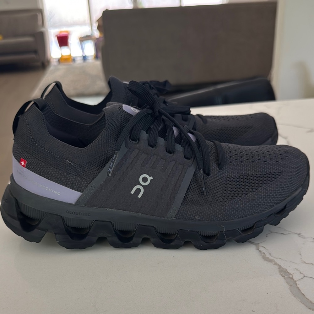 On Running Black Athletic Shoes with CloudTec Sole